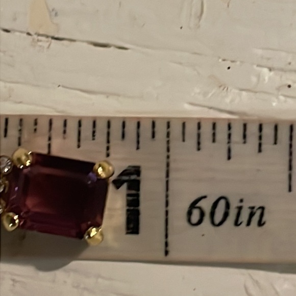 0.75” gold tone pendant with prong set amethyst color gem & 3 bezel set crystals - Picture 13 of 14